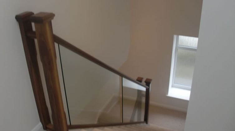 Glass panel staircase